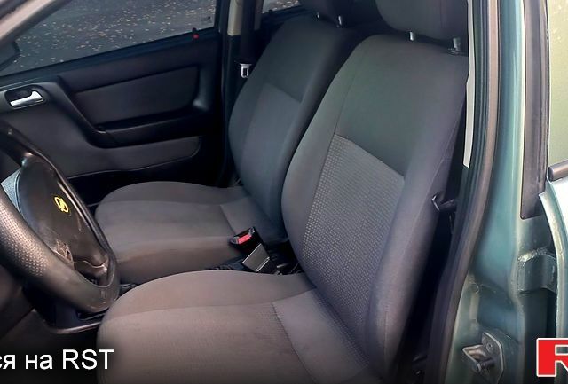 Зелений Опель Астра, об'ємом двигуна 1.4 л та пробігом 279 тис. км за 3700 $, фото 8 на Automoto.ua