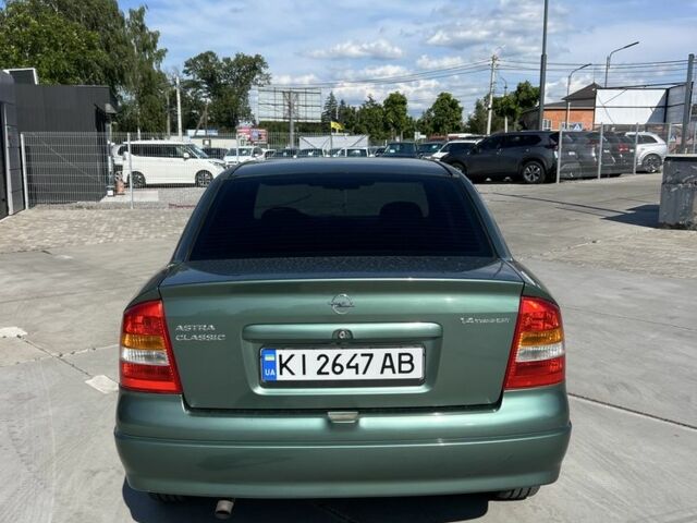 Зелений Опель Астра, об'ємом двигуна 1.4 л та пробігом 159 тис. км за 3999 $, фото 4 на Automoto.ua