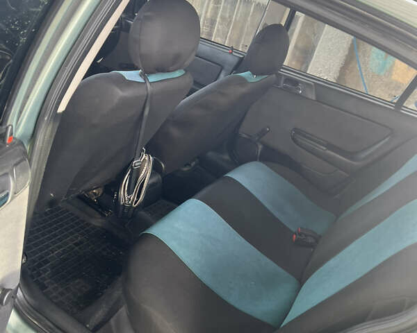 Зеленый Опель Астра, объемом двигателя 1.39 л и пробегом 190 тыс. км за 3500 $, фото 6 на Automoto.ua