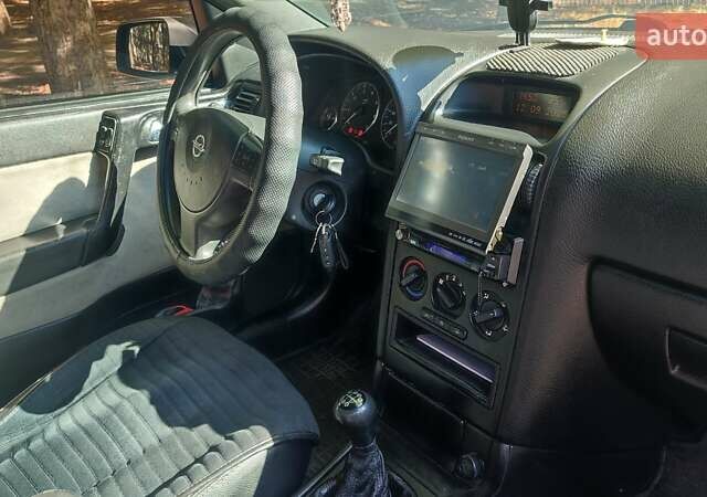 Зелений Опель Астра, об'ємом двигуна 1.59 л та пробігом 337 тис. км за 3800 $, фото 5 на Automoto.ua