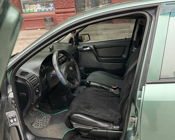 Зеленый Опель Астра, объемом двигателя 1.6 л и пробегом 260 тыс. км за 2350 $, фото 7 на Automoto.ua