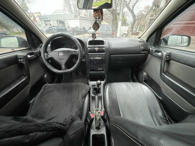 Зеленый Опель Астра, объемом двигателя 1.6 л и пробегом 260 тыс. км за 2350 $, фото 8 на Automoto.ua