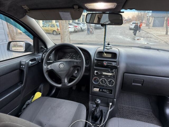 Зелений Опель Астра, об'ємом двигуна 1.4 л та пробігом 220 тис. км за 2499 $, фото 6 на Automoto.ua