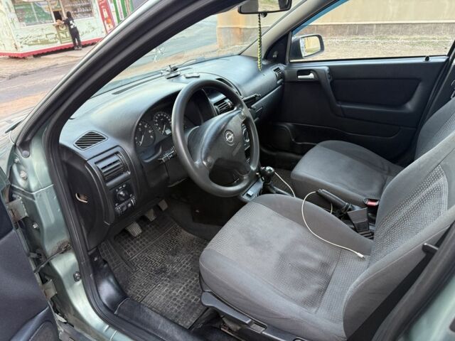 Зелений Опель Астра, об'ємом двигуна 1.4 л та пробігом 220 тис. км за 2499 $, фото 5 на Automoto.ua