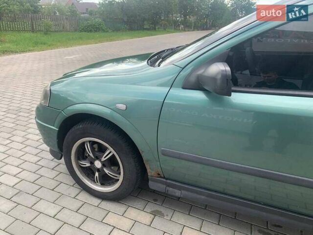 Зеленый Опель Астра, объемом двигателя 1.4 л и пробегом 362 тыс. км за 3000 $, фото 11 на Automoto.ua