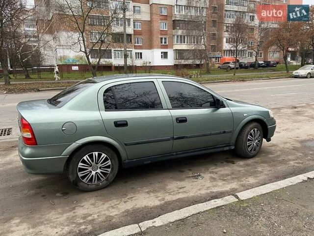 Зелений Опель Астра, об'ємом двигуна 1.39 л та пробігом 188 тис. км за 3342 $, фото 4 на Automoto.ua