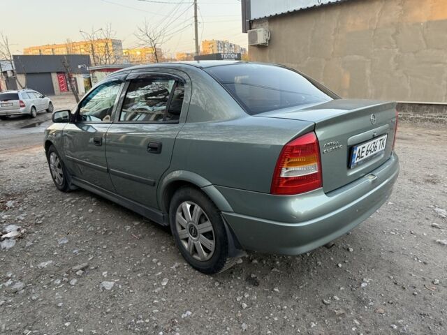 Зелений Опель Астра, об'ємом двигуна 1.4 л та пробігом 220 тис. км за 2499 $, фото 3 на Automoto.ua
