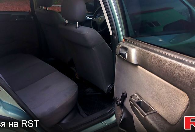 Зелений Опель Астра, об'ємом двигуна 1.4 л та пробігом 279 тис. км за 3700 $, фото 9 на Automoto.ua