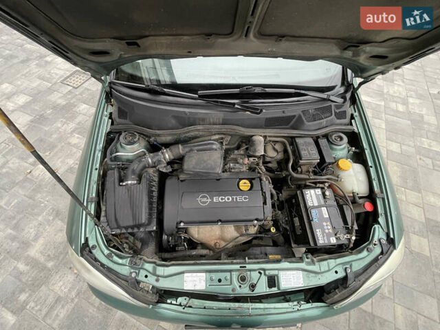 Зеленый Опель Астра, объемом двигателя 1.6 л и пробегом 260 тыс. км за 2350 $, фото 9 на Automoto.ua