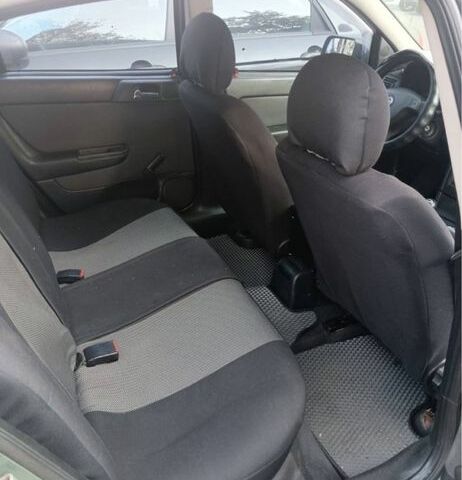 Зеленый Опель Астра, объемом двигателя 1.4 л и пробегом 290 тыс. км за 2500 $, фото 5 на Automoto.ua