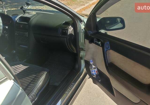 Зелений Опель Астра, об'ємом двигуна 1.59 л та пробігом 337 тис. км за 3800 $, фото 4 на Automoto.ua