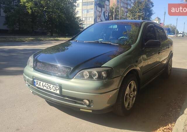Зелений Опель Астра, об'ємом двигуна 1.59 л та пробігом 337 тис. км за 3800 $, фото 14 на Automoto.ua