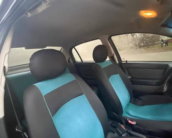 Зелений Опель Астра, об'ємом двигуна 1.39 л та пробігом 188 тис. км за 3342 $, фото 8 на Automoto.ua