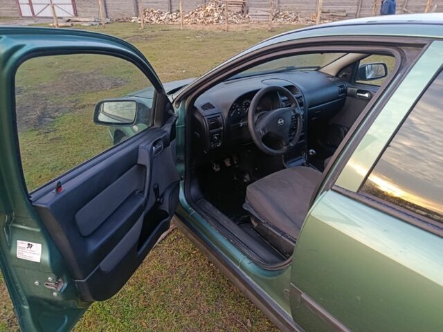 Зеленый Опель Астра, объемом двигателя 1.4 л и пробегом 360 тыс. км за 2550 $, фото 4 на Automoto.ua