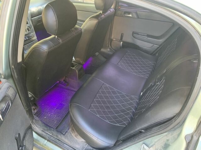 Зеленый Опель Астра, объемом двигателя 1.4 л и пробегом 187 тыс. км за 2450 $, фото 8 на Automoto.ua