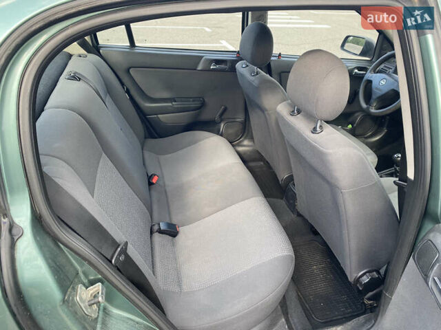 Зелений Опель Астра, об'ємом двигуна 1.4 л та пробігом 146 тис. км за 3800 $, фото 13 на Automoto.ua