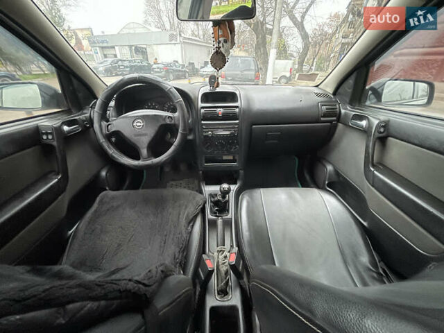 Зеленый Опель Астра, объемом двигателя 1.6 л и пробегом 260 тыс. км за 2350 $, фото 8 на Automoto.ua