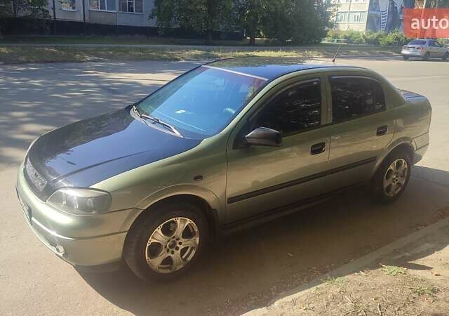 Зелений Опель Астра, об'ємом двигуна 1.59 л та пробігом 337 тис. км за 3800 $, фото 15 на Automoto.ua