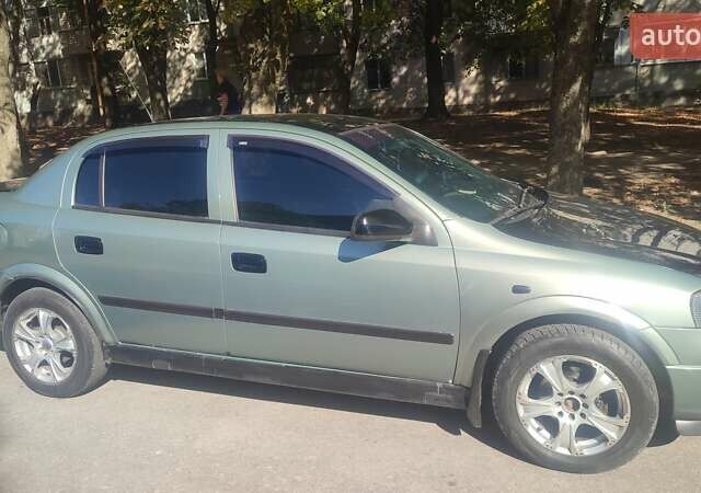 Зелений Опель Астра, об'ємом двигуна 1.59 л та пробігом 337 тис. км за 3800 $, фото 11 на Automoto.ua