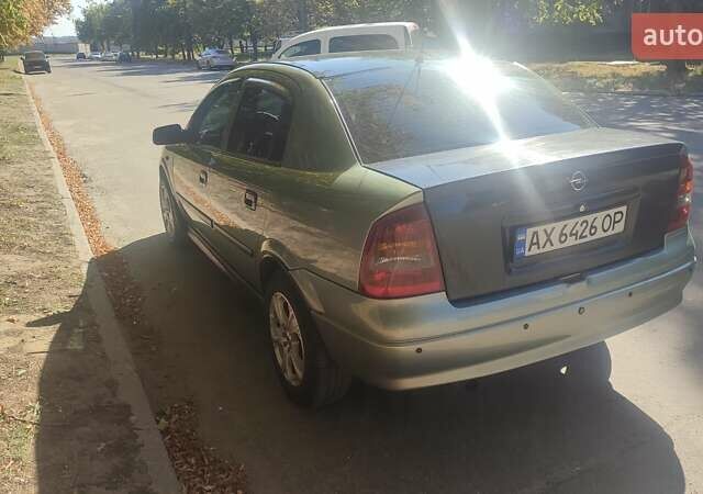 Зелений Опель Астра, об'ємом двигуна 1.59 л та пробігом 337 тис. км за 3800 $, фото 9 на Automoto.ua