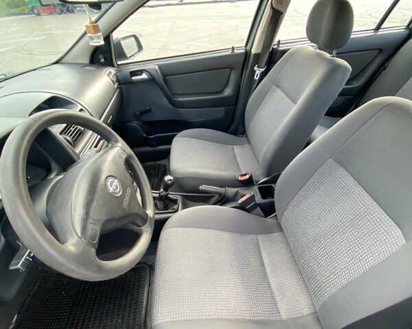 Зелений Опель Астра, об'ємом двигуна 1.4 л та пробігом 146 тис. км за 3800 $, фото 10 на Automoto.ua