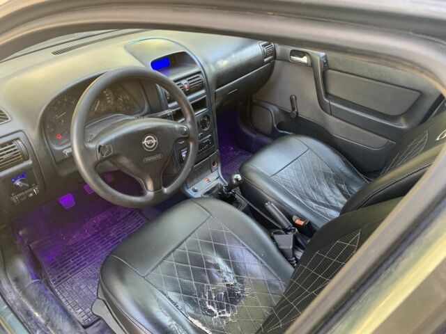 Зеленый Опель Астра, объемом двигателя 1.4 л и пробегом 187 тыс. км за 2450 $, фото 7 на Automoto.ua