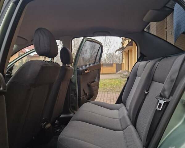 Зелений Опель Астра, об'ємом двигуна 1.36 л та пробігом 179 тис. км за 3000 $, фото 32 на Automoto.ua