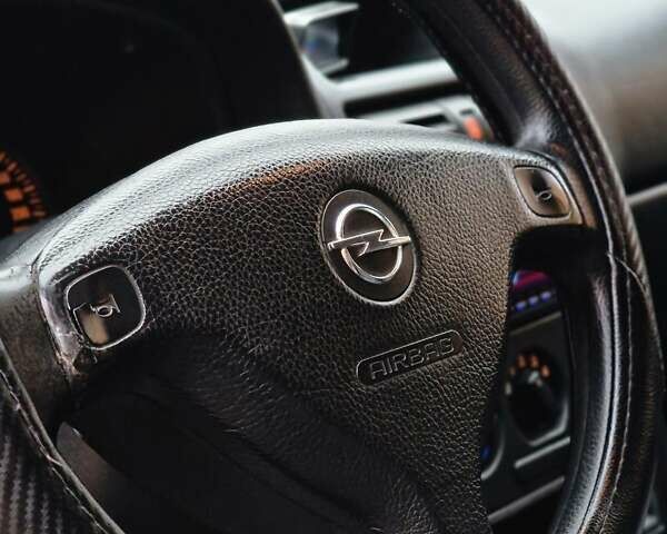 Зелений Опель Астра, об'ємом двигуна 1.36 л та пробігом 179 тис. км за 3000 $, фото 57 на Automoto.ua