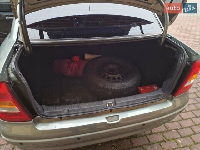 Зелений Опель Астра, об'ємом двигуна 1.36 л та пробігом 179 тис. км за 3000 $, фото 33 на Automoto.ua