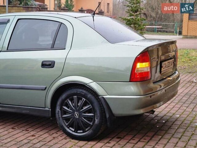 Зелений Опель Астра, об'ємом двигуна 1.36 л та пробігом 179 тис. км за 3000 $, фото 21 на Automoto.ua