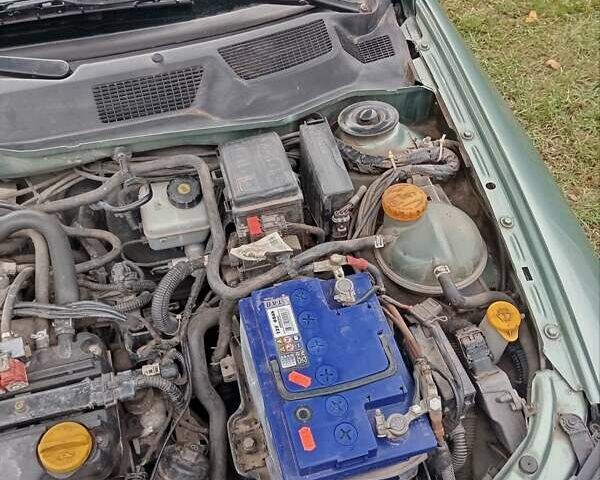 Опель Астра 2008 в Казатине на Automoto.ua Зеленый Опель Астра, объемом двигателя 1.39 л и пробегом 295 тыс. км за 3800 $, фото 11 на Automoto.ua