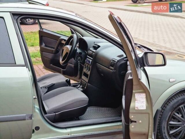 Зелений Опель Астра, об'ємом двигуна 1.36 л та пробігом 179 тис. км за 3000 $, фото 7 на Automoto.ua