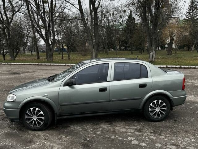 Зеленый Опель Астра, объемом двигателя 1.4 л и пробегом 235 тыс. км за 4000 $, фото 2 на Automoto.ua