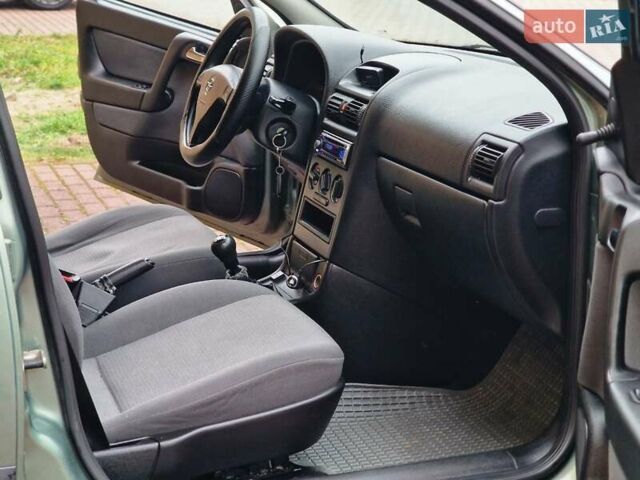 Зелений Опель Астра, об'ємом двигуна 1.36 л та пробігом 179 тис. км за 3000 $, фото 38 на Automoto.ua