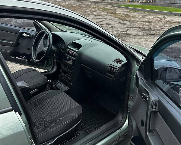Зелений Опель Астра, об'ємом двигуна 1.36 л та пробігом 235 тис. км за 4000 $, фото 8 на Automoto.ua