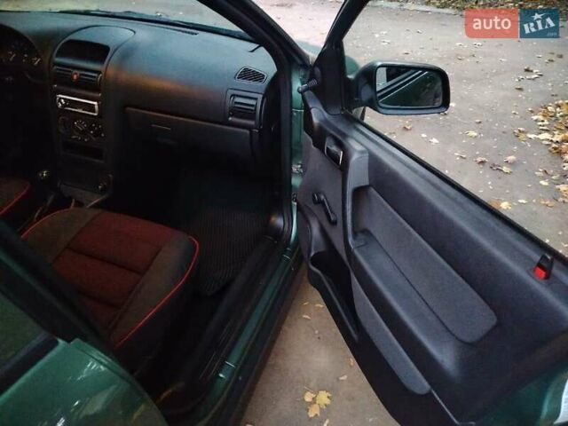 Зеленый Опель Астра, объемом двигателя 1.4 л и пробегом 91 тыс. км за 3800 $, фото 8 на Automoto.ua