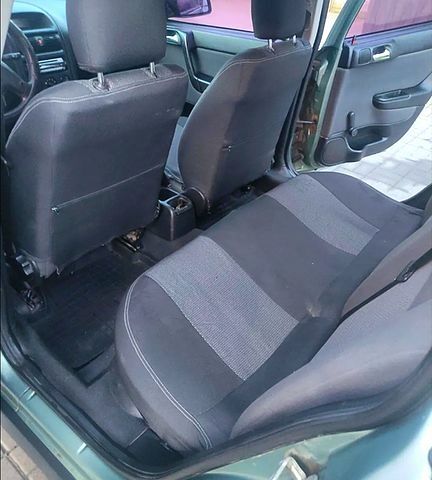 Зелений Опель Астра, об'ємом двигуна 1.4 л та пробігом 296 тис. км за 3400 $, фото 4 на Automoto.ua