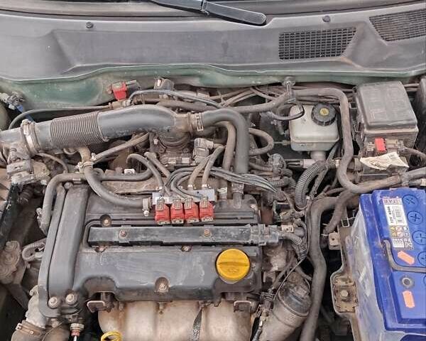 Опель Астра 2008 в Казатине на Automoto.ua Зеленый Опель Астра, объемом двигателя 1.39 л и пробегом 295 тыс. км за 3800 $, фото 12 на Automoto.ua