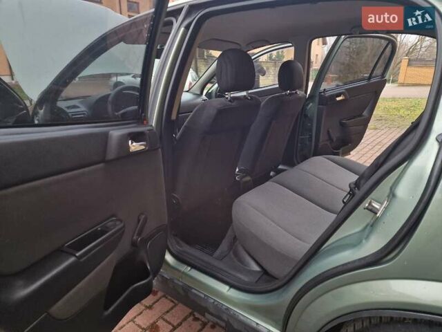 Зелений Опель Астра, об'ємом двигуна 1.36 л та пробігом 179 тис. км за 3000 $, фото 34 на Automoto.ua