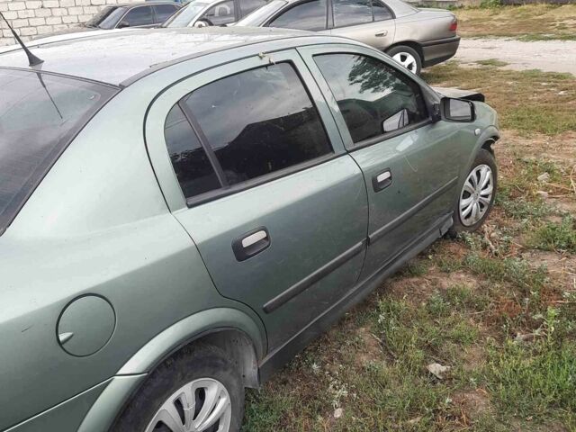 Зеленый Опель Астра, объемом двигателя 1.6 л и пробегом 190 тыс. км за 600 $, фото 3 на Automoto.ua