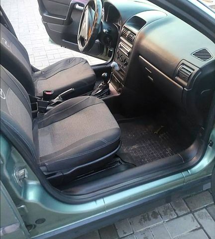 Зелений Опель Астра, об'ємом двигуна 1.4 л та пробігом 296 тис. км за 3400 $, фото 6 на Automoto.ua