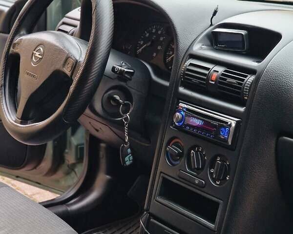 Зелений Опель Астра, об'ємом двигуна 1.36 л та пробігом 179 тис. км за 3000 $, фото 55 на Automoto.ua