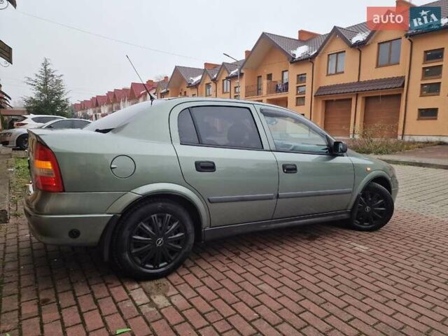 Зелений Опель Астра, об'ємом двигуна 1.36 л та пробігом 179 тис. км за 3000 $, фото 13 на Automoto.ua
