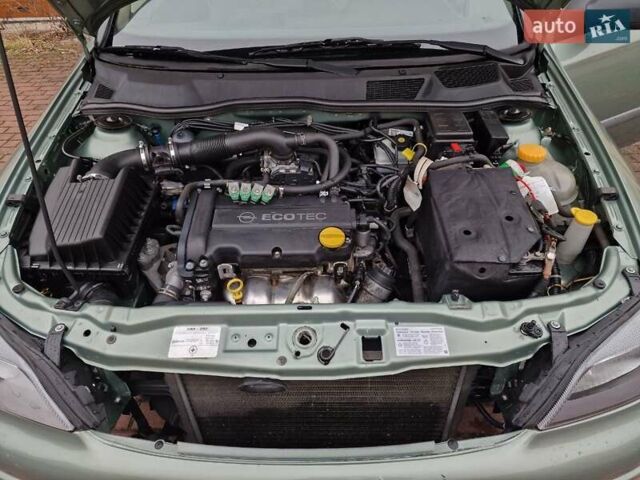 Зелений Опель Астра, об'ємом двигуна 1.36 л та пробігом 179 тис. км за 3000 $, фото 43 на Automoto.ua