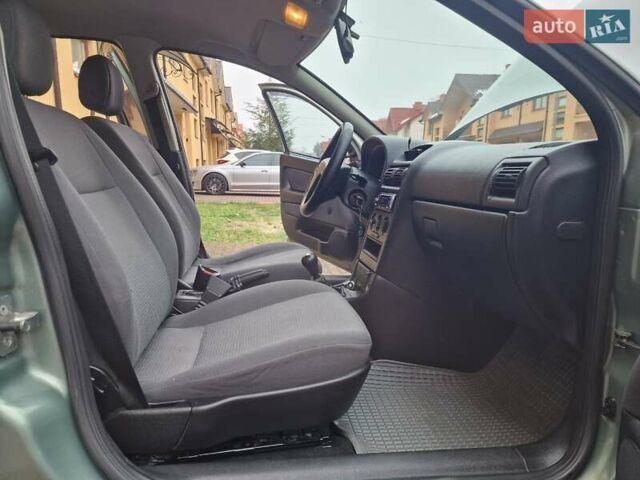 Зелений Опель Астра, об'ємом двигуна 1.36 л та пробігом 179 тис. км за 3000 $, фото 54 на Automoto.ua