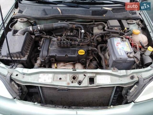 Зеленый Опель Астра, объемом двигателя 1.4 л и пробегом 296 тыс. км за 4200 $, фото 2 на Automoto.ua