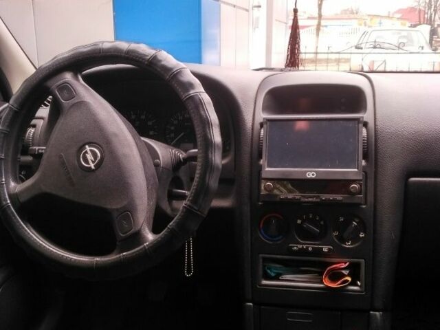 Опель Астра 2008 в Бердичеве на Automoto.ua Зеленый Опель Астра, объемом двигателя 1.6 л и пробегом 220 тыс. км за 3811 $, фото 4 на Automoto.ua