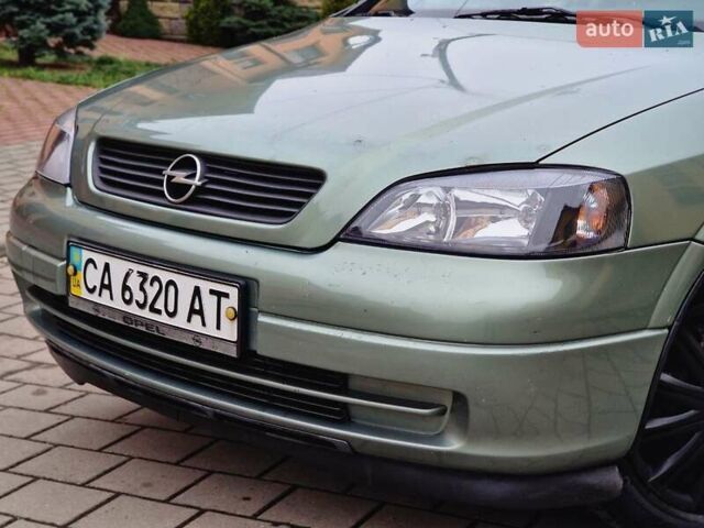 Зелений Опель Астра, об'ємом двигуна 1.36 л та пробігом 179 тис. км за 3000 $, фото 20 на Automoto.ua