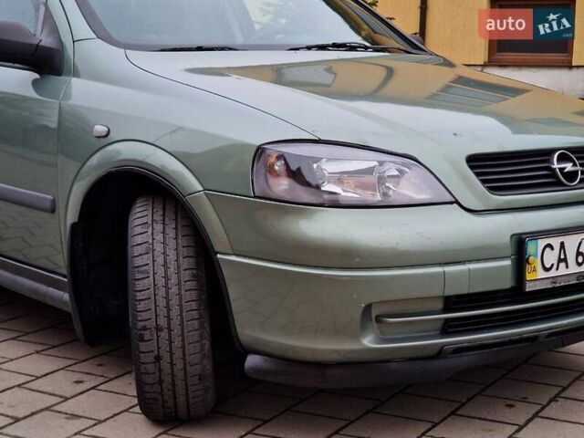 Зелений Опель Астра, об'ємом двигуна 1.36 л та пробігом 179 тис. км за 3000 $, фото 27 на Automoto.ua