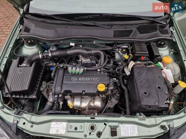 Зелений Опель Астра, об'ємом двигуна 1.36 л та пробігом 179 тис. км за 3000 $, фото 47 на Automoto.ua